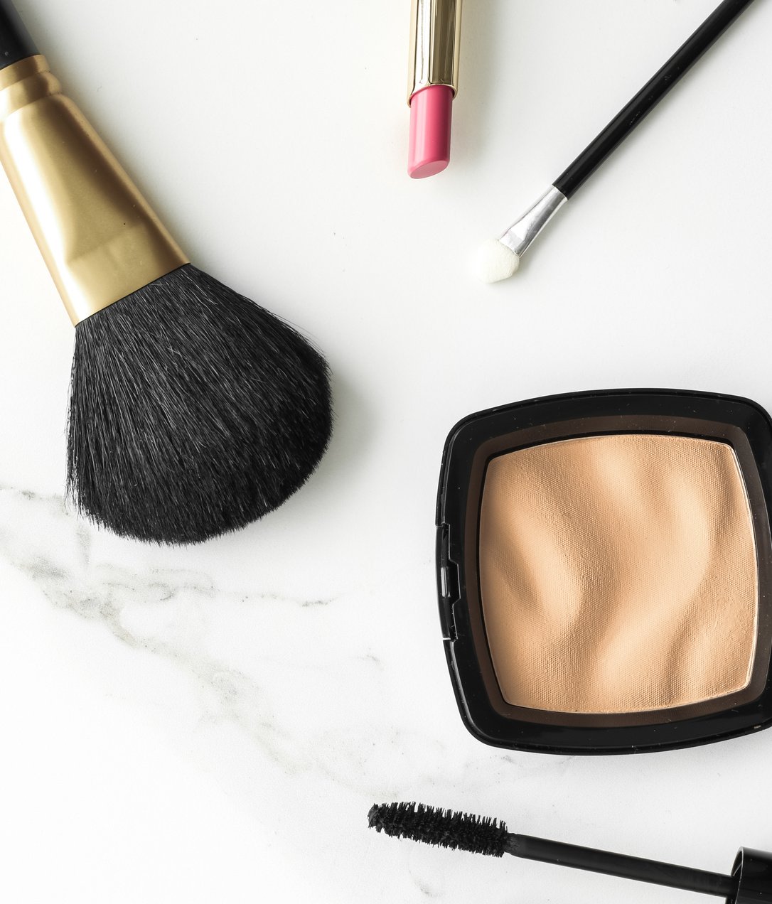 Make-up and cosmetics products on marble, flatlay background